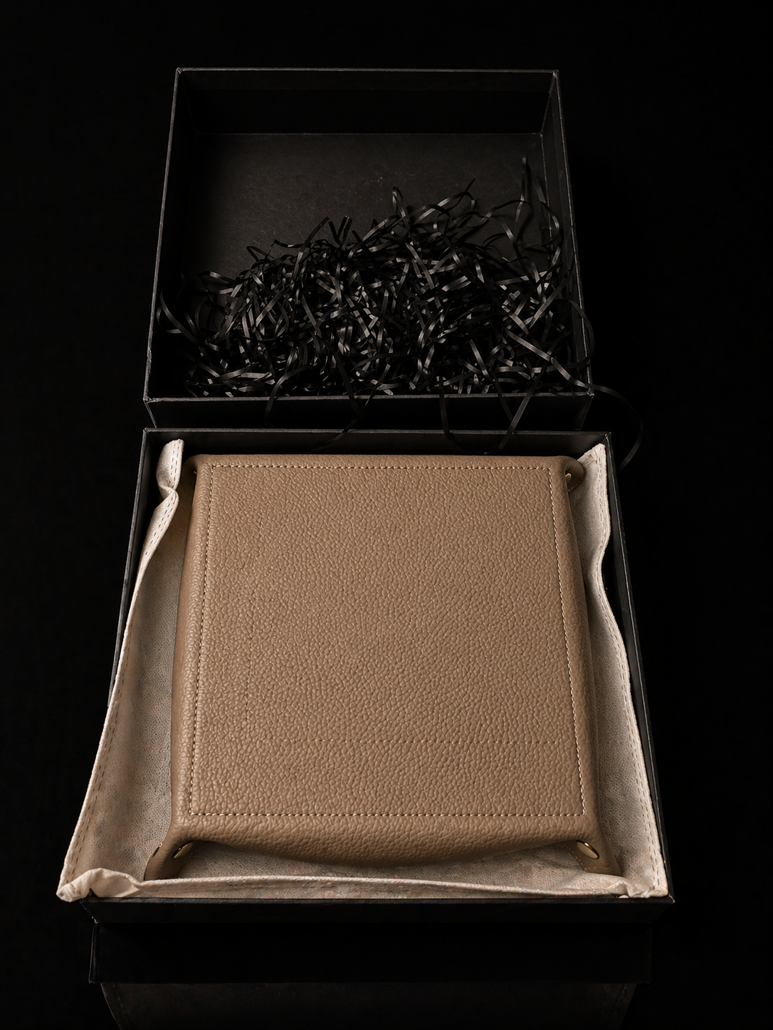 ZOWASHA leather valet tray exterior — pebble cowhide with brass snap hardware