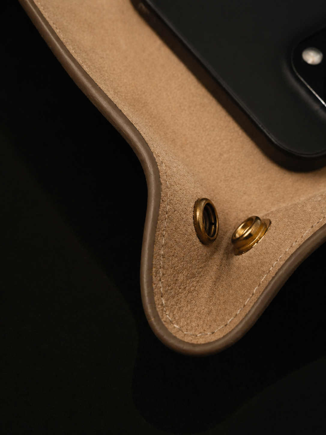 ZOWASHA gold foil stamp on warm sand suede interior